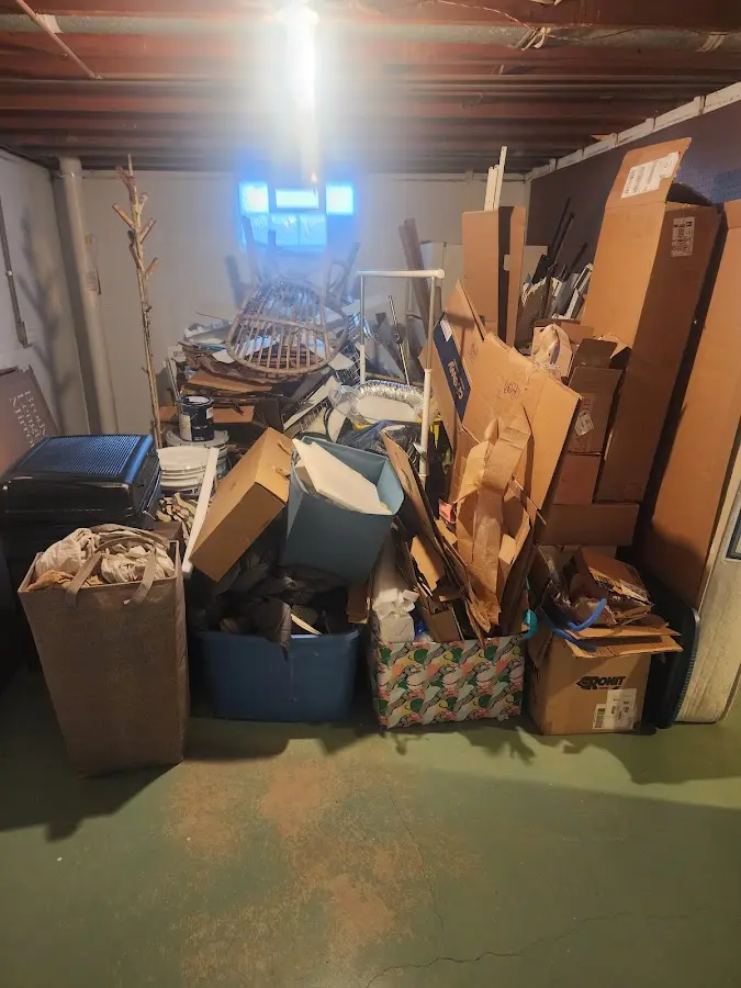 Roll-off dumpster container at job site for Concrete Dumpster Rental in Greenfield